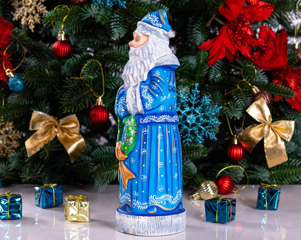 Blue Santa wood carving 11.5 inch, holding wreath, Christmas shelf or mantel decor