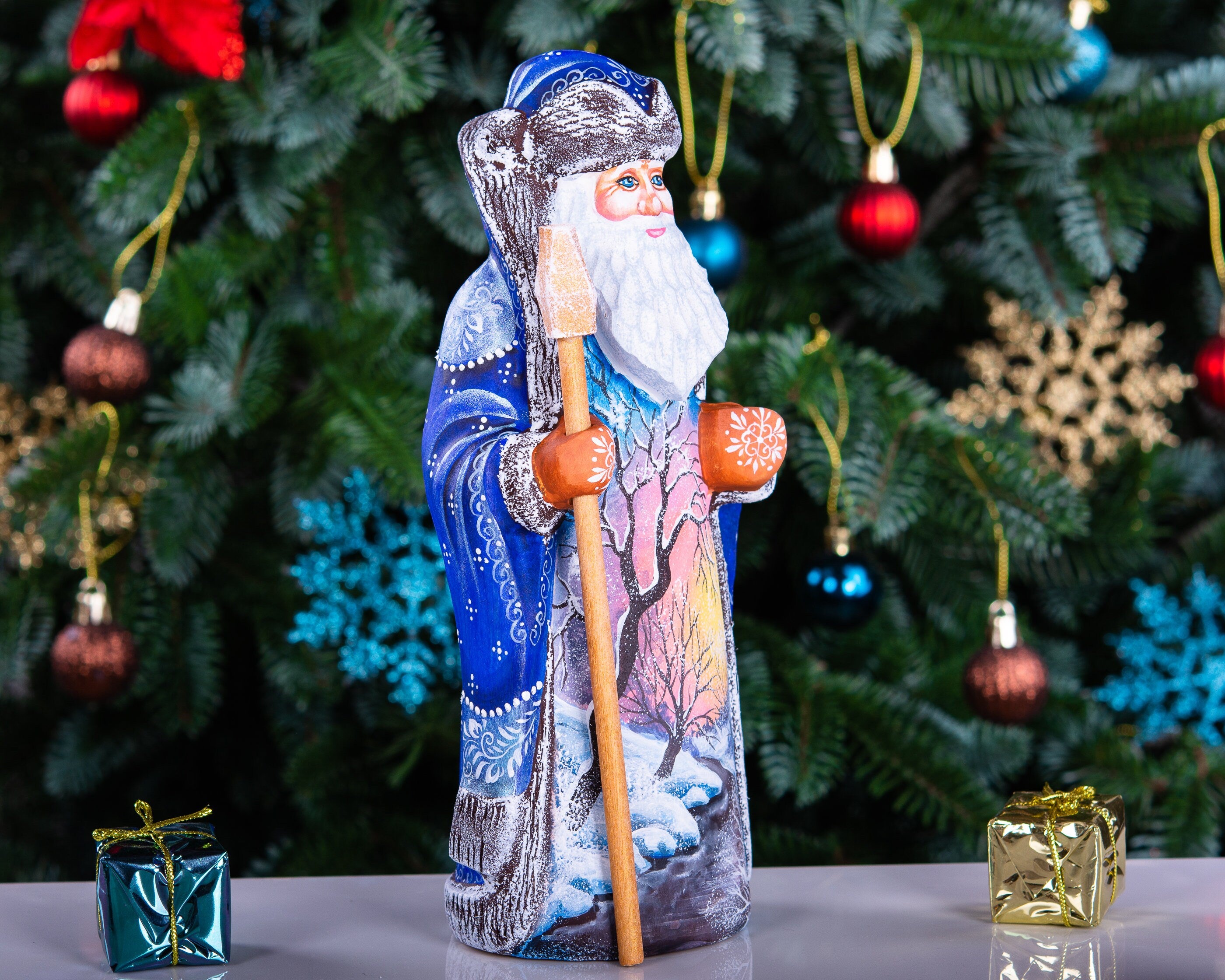 Hand carved wooden Santa figurine 9 inch, blue coat, winter landscape, holiday shelf decor