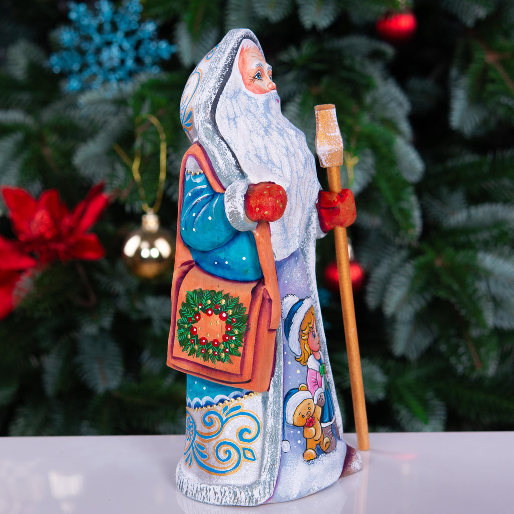 Hand carved Santa statue 9 inch, blue coat, child and teddy