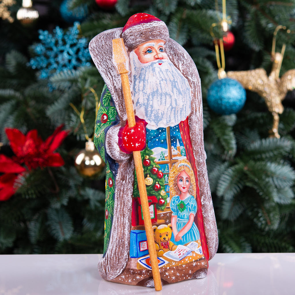 Collectible Santa figurine with staff, girl writing wish list scene, 9.5 inch