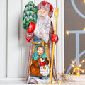 Hand carved Santa figurine 11 inch, winter village child, mantel Christmas decoration