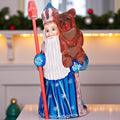 Old World Santa figurine 8.5 inch, carved wood, blue coat, holding bear, mantel display