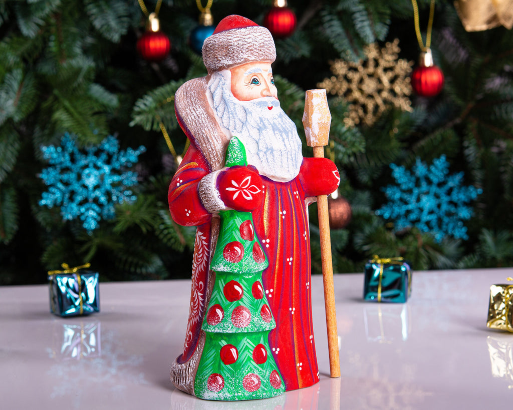 Hand carved wooden Santa figurine 8 inch, holding Christmas tree, holiday shelf decor