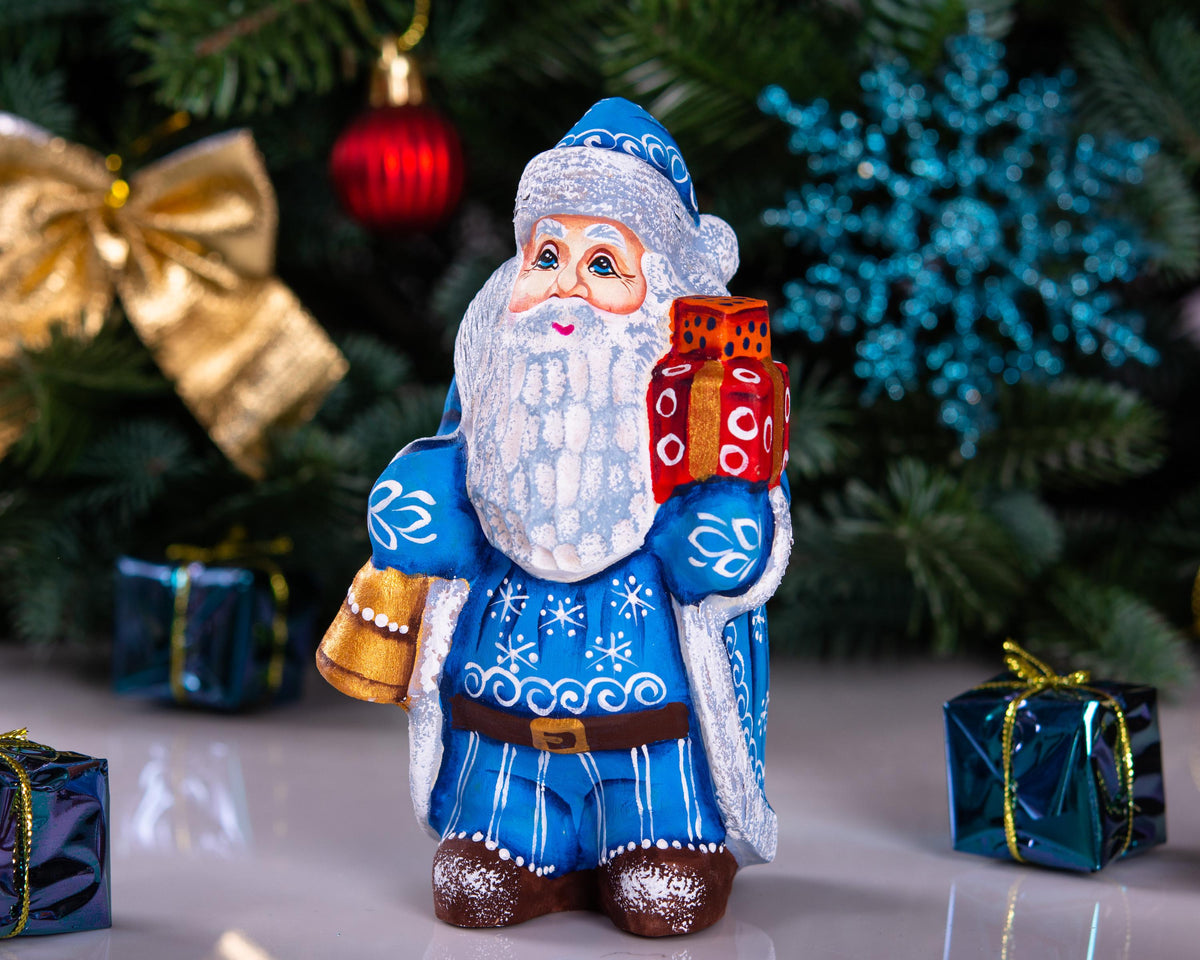 Blue Father Christmas figurine 5.5" with gold bell and stacked gifts