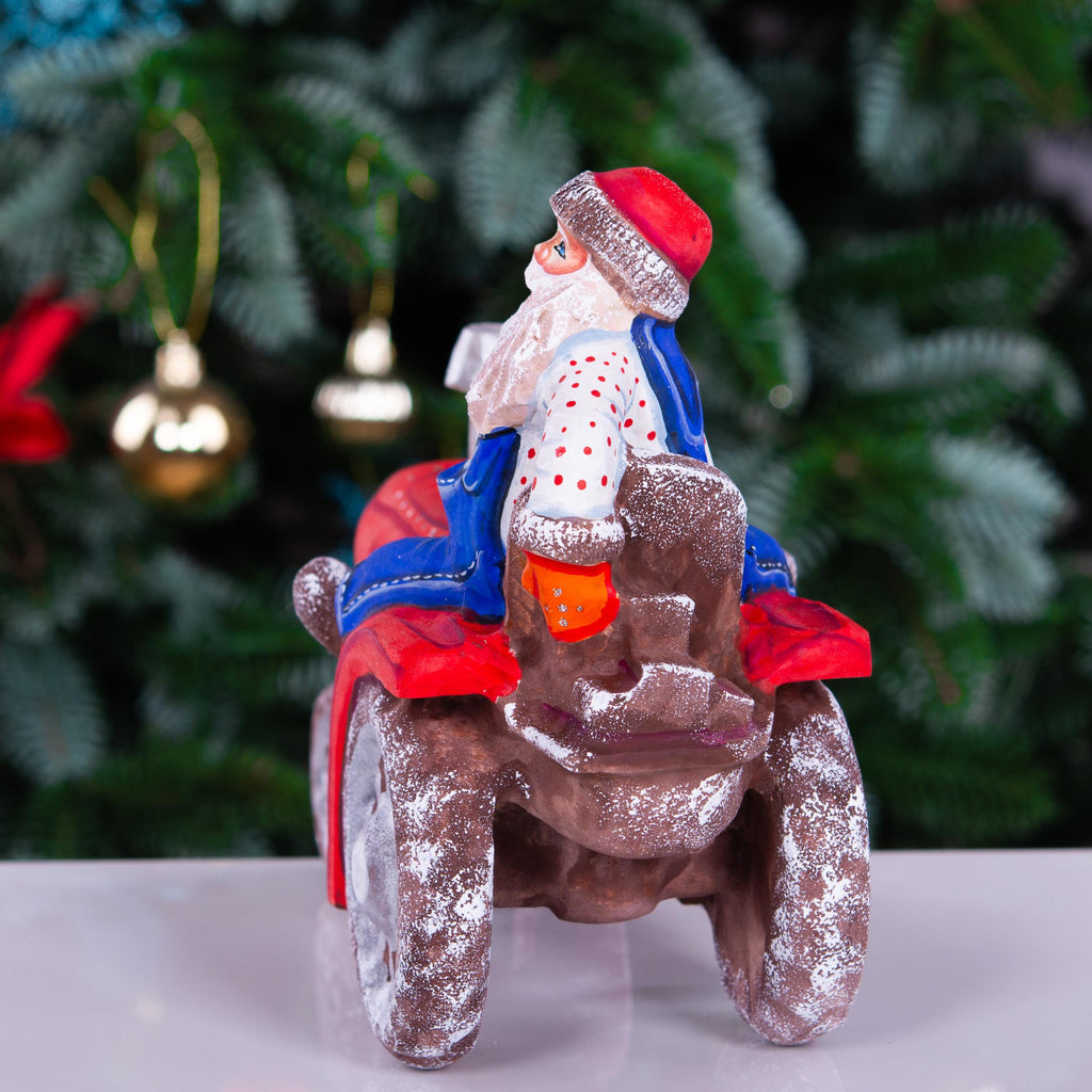 Hand-Carved Wooden Santa Claus Figurine on Tractor: Christmas Home Decor