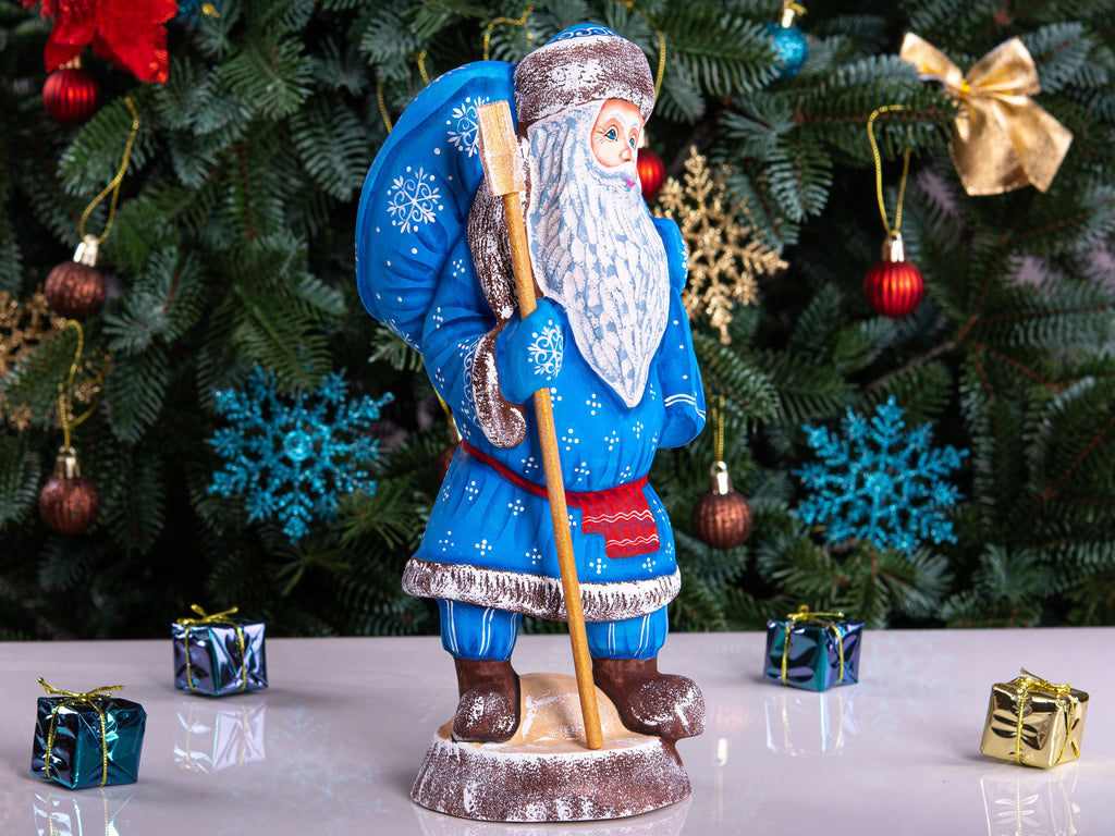Hand carved blue Santa figurine 11 inch, gift sack, mantel decor