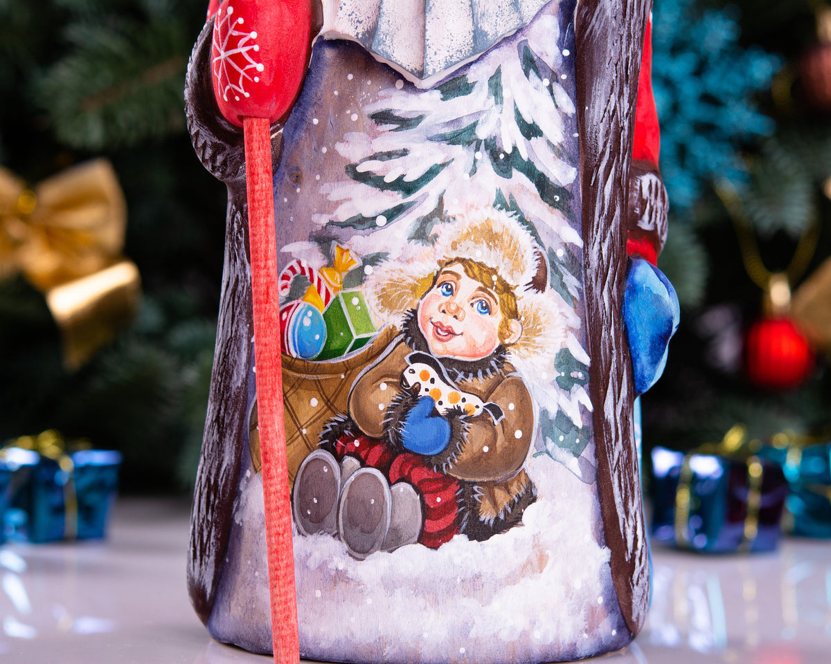 Hand carved wooden Santa figurine 9.5 inch, boy with sled, Christmas mantel decor