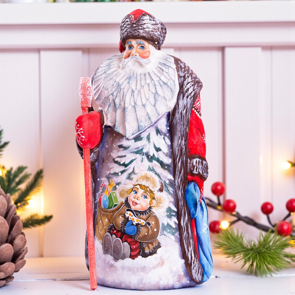 Hand carved wooden Santa figurine 9.5 inch, boy with sled, Christmas mantel decor