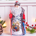 Hand carved wooden Santa figurine 9.5 inch, boy with sled, Christmas mantel decor