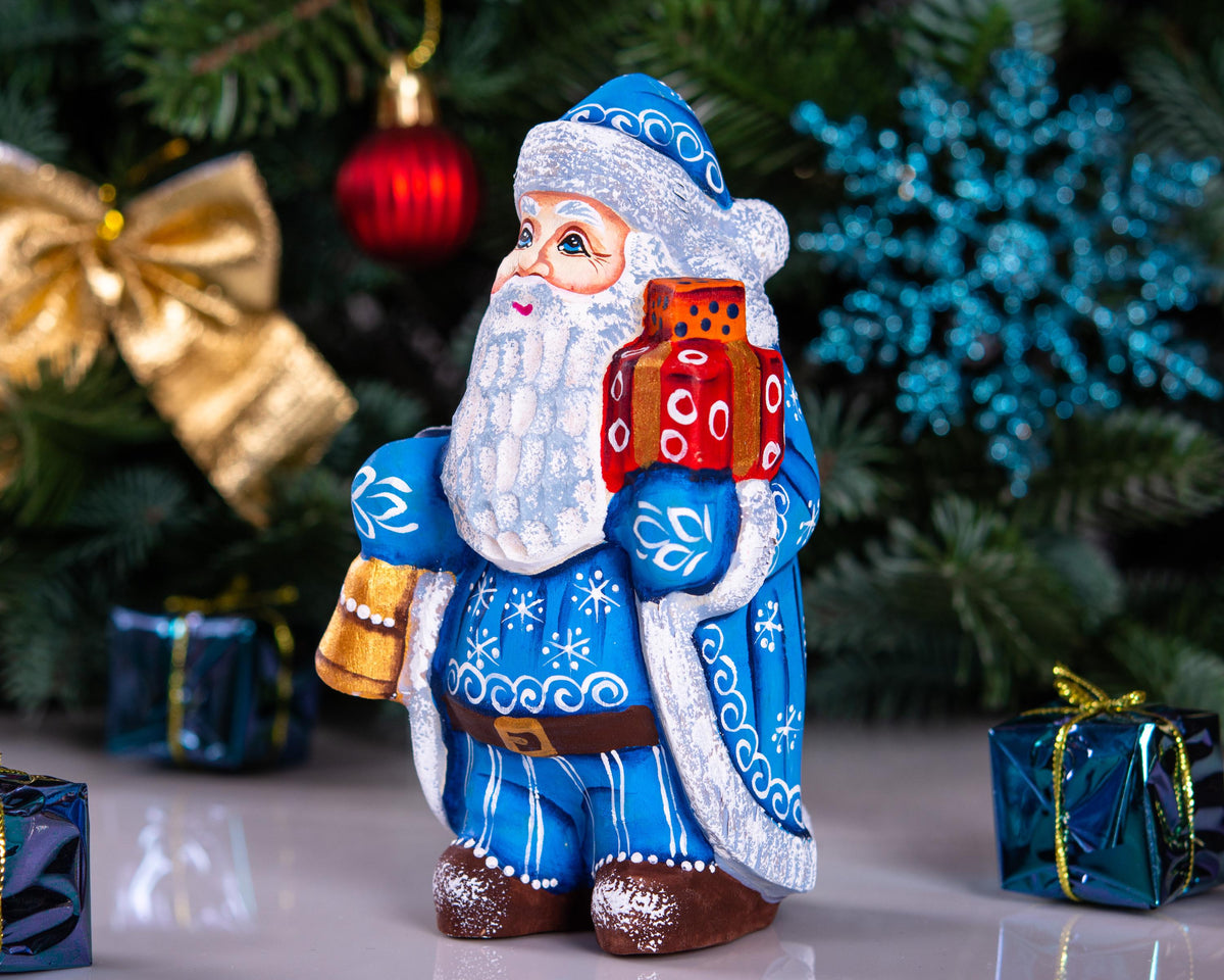 Blue Father Christmas figurine 5.5" with gold bell and stacked gifts