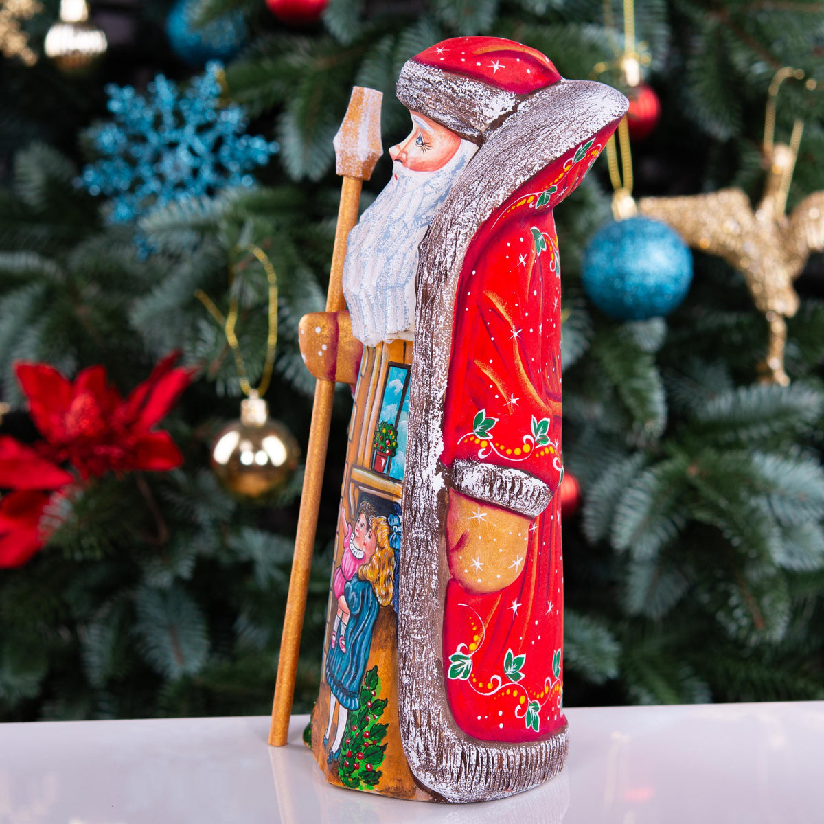 Collectible Santa figurine, folk art children and toys scene, 9.4 inch