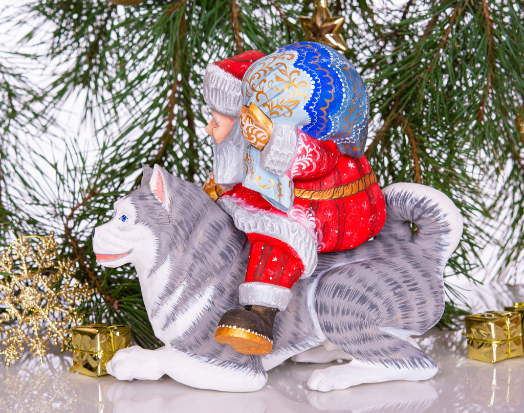 Hand-Carved Santa Claus Figurine on Dog: Retro Christmas Decor