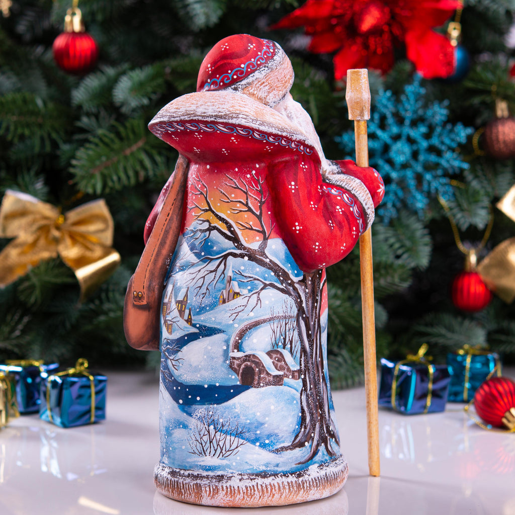 Red Santa Claus Figurine with Staff and Bag, Hand Painted Wood Christmas Decor with Snowy Landscape, Holiday Gift for Home or Collection