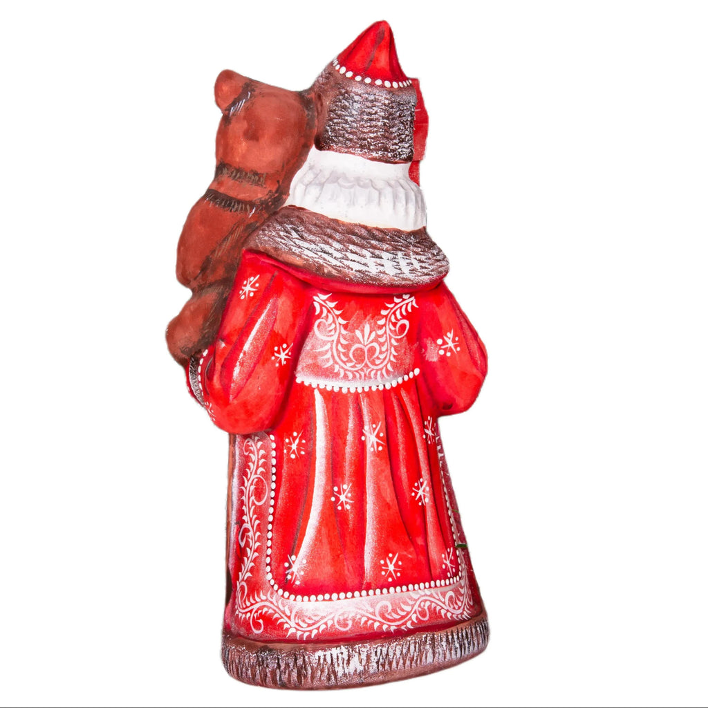 Hand carved wooden Santa figurine 8.5 inch, holding bear, holiday shelf decor