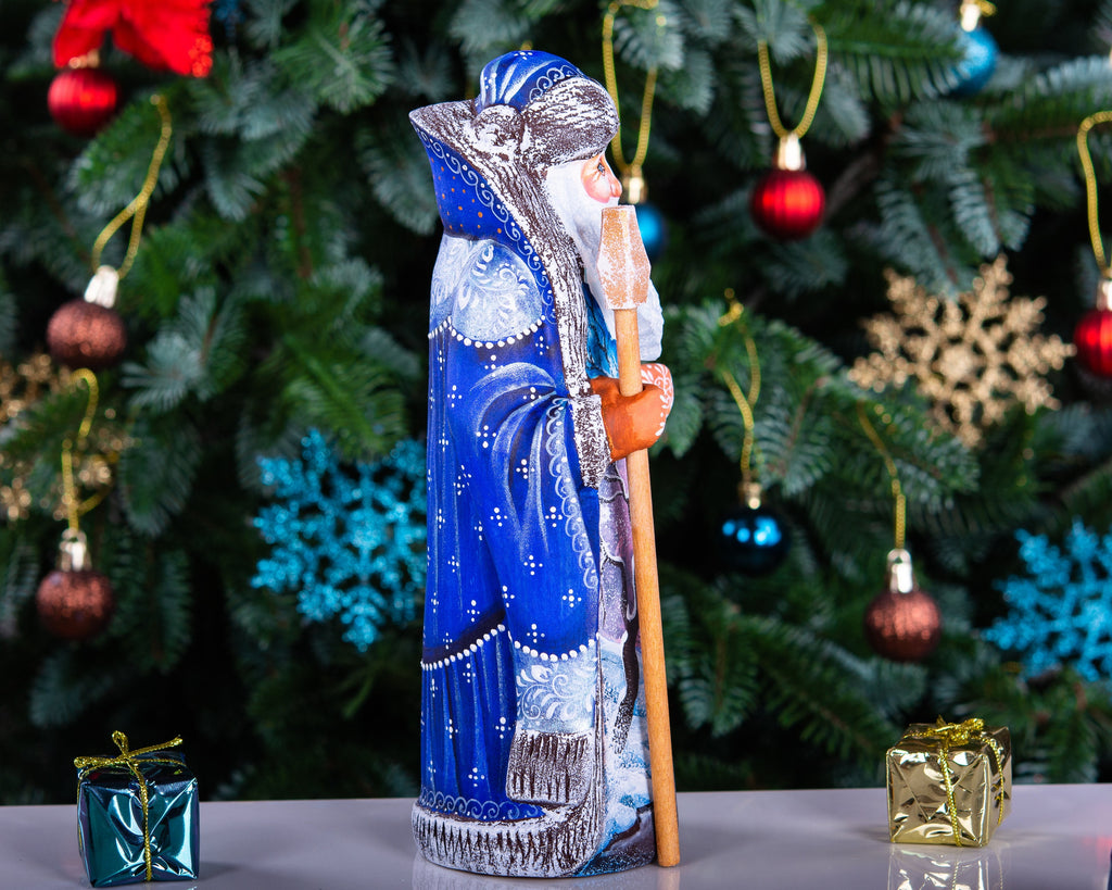 Hand carved wooden Santa figurine 9 inch, blue coat, winter landscape, holiday shelf decor